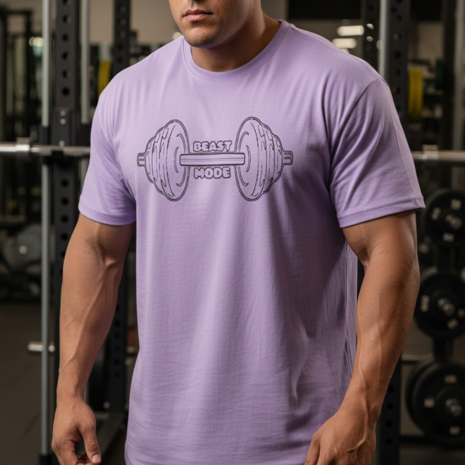 Man wearing a purple t-shirt with a barbell graphic in a gym setting